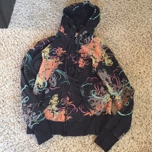 Black with colorful lines zip up hoodie.